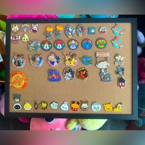 Various Disney park pins winners choice